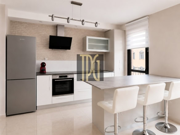 Modern kitchen with a stainless steel refrigerator, built-in oven, black range hood, white cabinets, and a marble island with four white stools.